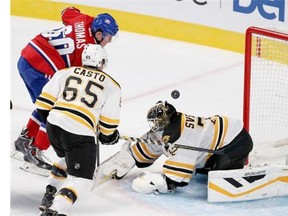 Canadiens’ Christian Thomas scores against Boston Bruins during National Hockey League pre-season game in Montreal Tuesday September 23, 2014.