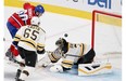 Canadiens’ Christian Thomas scores against Boston Bruins during National Hockey League pre-season game in Montreal Tuesday September 23, 2014.
