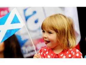 A child holds a Scottish flag ahead of the referendum on Scotland’s independence.