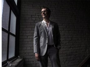 Atom Egoyan stops for a photo in Toronto on May 7, 2014. THE CANADIAN PRESS/Chris Young