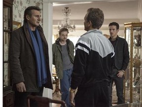 This photo released by Universal Pictures shows, from left, Liam Neeson, as Matt Scudder, Boyd Holbrook as Peter Kristo, Sebastian Roche as Yuri Landau, and Dan Stevens as Kenny Kristo, in a scene from the film, “A Walk Among the Tombstones." (AP Photo/Universal Pictures, Atsushi Nishijima)