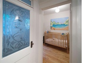 Etched glass window and babies room at the home of Marie-Pier Veilleux in Montreal, Thursday, August 14, 2014.