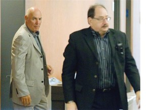 Former FTQ union boss Jocelyn Dupuis, left, was found guilty of fraud on Friday, Sept. 26, 2014, at the Montreal courthouse.