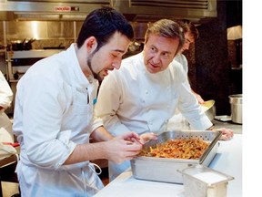 French-born New York chef Daniel Boulud (right) with Maison Boulud executive chef Riccardo Bertolino on Wednesday, August 20, 2014 at the Ritz Carlton. Chef Boulud runs restaurants around the world. (John Kenney / THE GAZETTE)