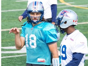 You have to prove yourself every day,” says Alouettes quarterback Jonathan Crompton, with team slotback S.J. Green during practice in Montreal on Thursday, Sept. 18, 2014. Phil Carpenter / THE GAZETTE