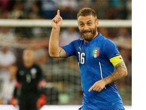 Italy’s Daniele De Rossi celebrates after scoring during a friendly soccer match between Italy and The Netherlands in Bari, Italy, on Thursday. He is out with a knee injury for a European Championship qualifier against Norway on Tuesday.
