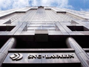 SNC-Lavalin, which cut an unspecified number of employees on Tuesday, reported a 13-per-cent drop in revenue in the second quarter of 2014. Ryan Remiorz/THE CANADIAN PRESS