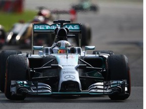 Lewis Hamilton of Great Britain and Mercedes GP celebrates after winning the F1 Grand Prix of Italy at Autodromo di Monza on Sunday in Monza.