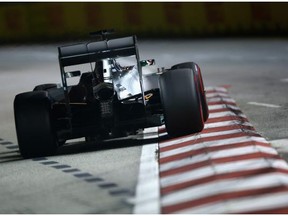 Lewis Hamilton of Great Britain and Mercedes GP drives during qualifying ahead of the Singapore Formula One Grand Prix on Saturday in Singapore.