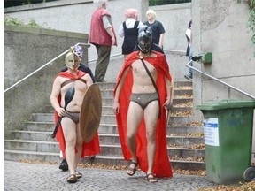 Manga aficionados in Roman look make their way to the "Connichi" manga fair in Kassel, central Germany, on September 12, 2014. The "Connichi" is considered as the country's biggest convention of manga style fans.