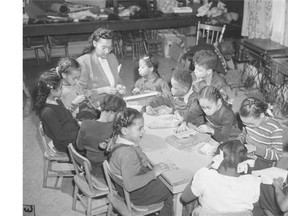 Members of the Negro Community Centre met in the cramped quarters of the Union United Church basement on Delisle St., seen here, until the centre moved to 2035 Coursol St. in 1955. This photo of an embroidery lesson was taken by freelance photographer Conrad Poirier in March 1949.  Courtesy of the Bibliothèque et Archives nationales du Québec.