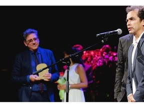 Mexican filmmaker Luiz Urquiza Mondragon accepts the Grand Prix des Amériques award for his film Obediencia Perfecta at the Festival des films du monde Monday evening.