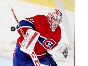 Mont­real Cana­diens goal­ie Carey Price makes a save against the visiting Wash­ing­ton Cap­i­tals dur­ing the third per­iod of a Na­tion­al Hockey League pre-sea­son game on Sunday at the Bell Centre. (John Mahoney / THE GAZ­ETTE)