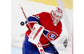 Mont­real Cana­diens goal­ie Carey Price makes a save against the visiting Wash­ing­ton Cap­i­tals dur­ing the third per­iod of a Na­tion­al Hockey League pre-sea­son game on Sunday at the Bell Centre. (John Mahoney / THE GAZ­ETTE)