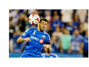 Montreal Impact’s Dilly Duka heads the ball against Los Angeles Galaxy during Major League Soccer action at Stade Saputo in Montreal Sept. 10, 2014.