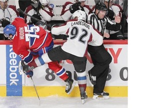 Colorado Avalanche's Gabriel Landeskog sticks his leg out to slow down Montreal Canadiens Charles Hudon during National Hockey League pre-season game in Montreal Thursday September 25, 2014.