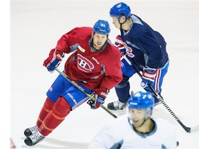 Montreal Canadiens left wing Travis Moen takes part in a team practice at the Bell Sports Complex in Brossard, south of Montreal on Tuesday, September 30, 2014.