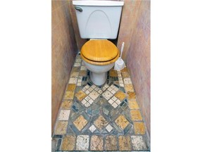 Toilet in artist Helga Schleeh's apartment in the Notre-Dame-de-Grace district of Montreal Tuesday September 02, 2014.  She laid the stone tile herself.