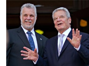 Quebec Premier Philippe Couillard, left meets German president Joachim Gauck Saturday, September 27, 2014 in Quebec City. THE CANADIAN PRESS/Clement Allard