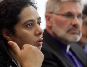 Tahira Malik, left, daughter of Khurshid Begum Awan, during a news conference in Montreal on Monday Sept. 22, 2014, with bishop Barry Clarke, to avoid deportation of her mother.
