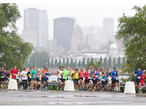 Runners participate in the Rock ‘n’ Roll Montreal marathon, Sunday September 22, 2013.