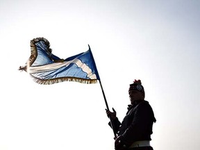 A member of the Grand Orange Lodge of Scotland prepares to march in Edinburgh, on September 13, 2014.  Thousands of members of the Protestant Orange order marched through Edinburgh in a show of strength against Scottish independence, as the final weekend of campaigning for the referendum got underway with everything to play for.