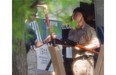 Police officers catalogue guns outside the home of Isidore Havis, the armed 71-year-old man involved in a 20-hour police standoff in 2013, in the Cote-St-Luc area of Montreal.