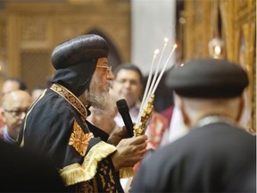 Pope Tawadros II of the Coptic Orthodox Church recites a prayer at St Marc’s Coptic Church in Montreal, Saturday, Sept. 20, 2014.
