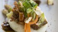 Kyozon's menu features New-Asian food such as these pork belly steamed buns. (Photo by Georges Alexandar)