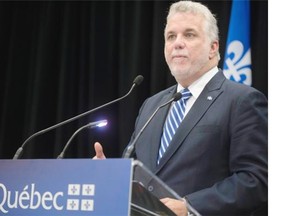 Premier of Quebec Philippe Couillard speaks during a press conference at the Palais des congres de Montréal at the opening of the Conference Objectif Nord in Montreal, on Tuesday, September 30, 2014.