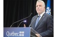 Premier of Quebec Philippe Couillard speaks during a press conference at the Palais des congres de Montréal at the opening of the Conference Objectif Nord in Montreal, on Tuesday, September 30, 2014.