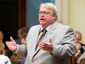 Quebec Health Minister Barrette at the Quebec legislature in July 2014.