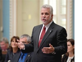 Quebec Premier Philippe Couillard responds to opposition questions as the legislature reconvenes for its fall session, Tuesday, September 16, 2014 at the legislature in Quebec City.