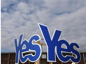 Yes Signs are displayed in Eyemouth, Scotland, on Monday. Polls predict a close vote in the coming landmark referendum on Scottish independence from Britian on Sept. 18.