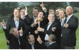 Europe team captain Paul McGinley, holding the trophy, and his team celebrate after winning the Ryder Cup on Sunday.