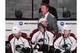 Colorado Avalanche coach Patrick Roy talks to linesman during National Hockey League pre-season game against the Canadiens in Montreal Thursday September 25, 2014.