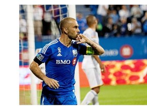 MONTREAL, QUE.: SEPTEMBER 10, 2014-- Montreal Impact Marco Di Vaio reacts after scoring against  Los Angeles Galaxy Brian Rowe, not seen, during Major League Soccer action at Stade Saputo in Montreal on Wednesday September 10, 2014.  (Allen McInnis / THE GAZETTE)  ORG XMIT: 50905