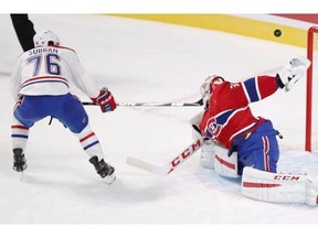 P.K. Subban tries to get past Carey Price during the Montreal Canadiens Red-White intra-squad game at the Bell Centre in Montreal Monday, Sept. 22, 2014.