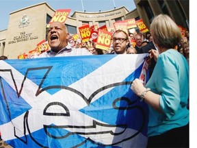 A Yes supporter crashes a Labour Better Together rally on Thursday as the campaign ahead of the Scottish independence referendum intensifies.