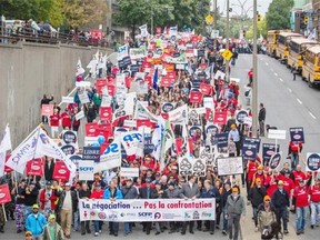 Thousands of protesters march down Berri St. in a demonstration last Saturday against Bill 3, a proposal to restructure municipal pension funds in Quebec.