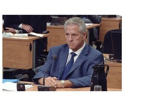 Tony Accurso listens as Justice France Charbonneau explains why she’s lifting a publication ban on his testimony at the Charbonneau Commission Tuesday September 2, 2014, in Montreal. It was Accurso’s first day of testimony and the first day of hearings after a summer break.