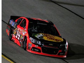 Tony Stewart, driver of the Bass Pro Shops/Mobil 1 Chevrolet, drives on the apron after being involved in an on-track incident during the NASCAR Sprint Cup Series Oral-B USA 500 at Atlanta Motor Speedway on Sunday in Hampton, Ga.