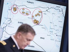 Lt. Gen. William C. Mayville Jr., Joint Staff Director of Operations Director of Operations, speaks about airstrikes in Syria during a briefing at the Pentagon September 23, 2014 in Washington, DC.