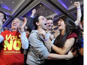Pro-union supporters celebrate as Scottish independence referendum results are announced at a ‘Better Together’ event in Glasgow, Scotland, on September 19, 2014.