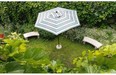 A view of the ground-level garden taken from the rooftop terrasse of Graziella Malagoni’s home.