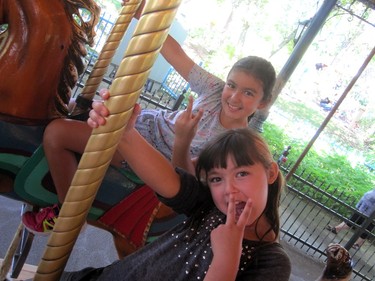 Selina and Auryann enjoy Labour Day at La Ronde.