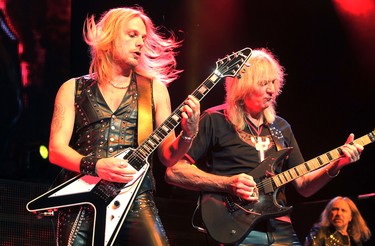 Judas Priest guitarists Richie Faulkner, left, and Glenn Tipton with bassist Ian Hill in concert at the Bell Centre in Montreal Monday October 06, 2014.  (John Mahoney  / THE GAZETTE)