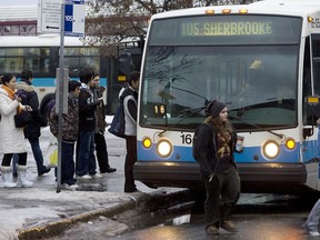 Montrealers line up to get on the 105 bus at the Vendôme métro in December 2008.