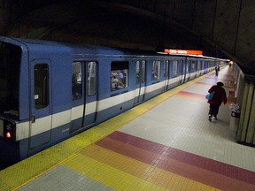 Métro cars leave the Villa-Maria métro station  on the Orange line.