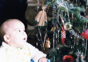 Sam, 5 mths old, visits the christmas tree every chance he gets.. &ampnbsp;